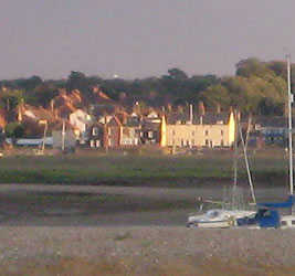 You can see Jolly Sailor Cottage by the sea shore